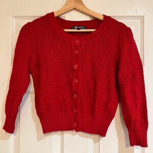 Cropped red cardigan